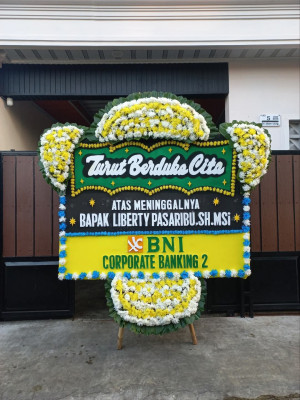 Papan Bunga Duka di Toma